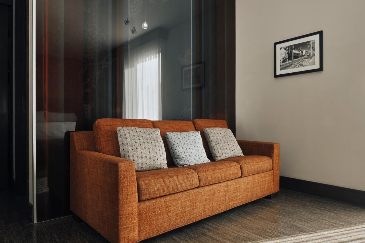 Suite mit Kingsize-Bett und Balkon